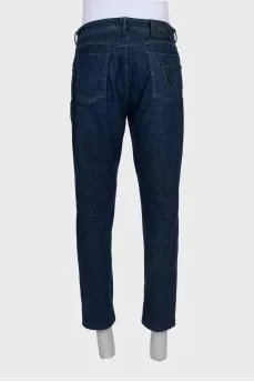 Men's dark blue straight leg jeans with leather jacron