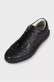 Men's black leather sneakers with branded embossing