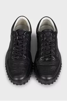 Men's black leather sneakers with branded embossing