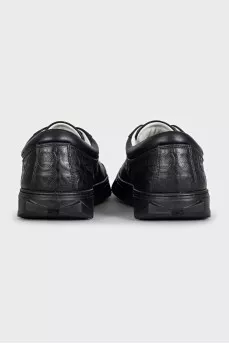 Men's black leather sneakers with branded embossing