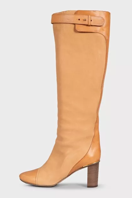 Beige leather boots with a heel