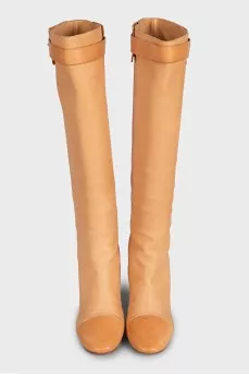 Beige leather boots with a heel