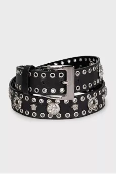 Leather belt decorated with eyelets and crystals