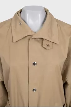 Cropped beige coat with buttons