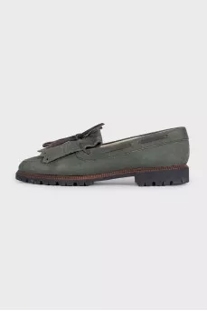 Green suede loafers with tassels