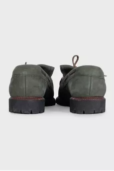 Green suede loafers with tassels