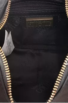 Black textile bag with a gold strap