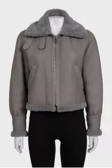 Gray leather sheepskin coat with fur and a high collar