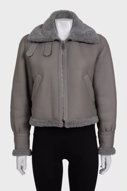 Gray leather sheepskin coat with fur and a high collar