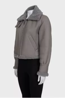 Gray leather sheepskin coat with fur and a high collar