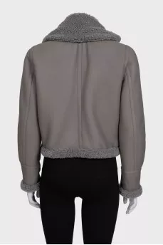 Gray leather sheepskin coat with fur and a high collar