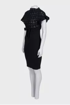 Black fitted dress with a bow and tag