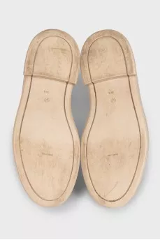 Beige leather boots with a zipper