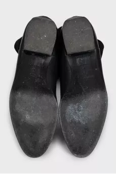 Black leather boots with suede inserts