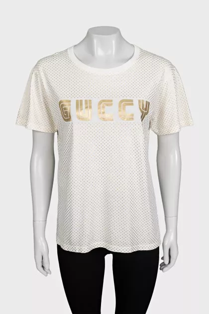 Beige T-shirt with a gold logo