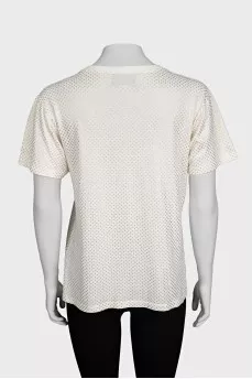 Beige T-shirt with a gold logo