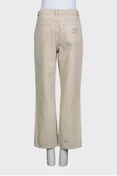 High-waisted straight-leg jeans with buttons