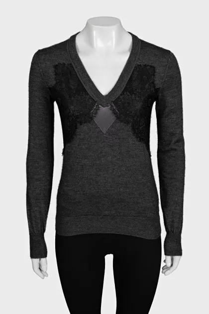 Dark blue pullover decorated with lace