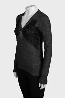 Dark blue pullover decorated with lace