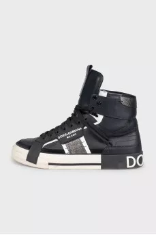 Black high-top sneakers made of leather and suede