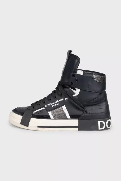 Black high-top sneakers made of leather and suede