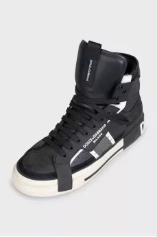 Black high-top sneakers made of leather and suede