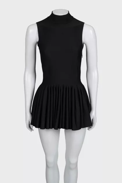 Black dress with ruffles on the skirt