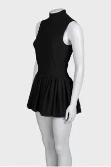Black dress with ruffles on the skirt
