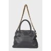 Leather bag with a brand's logo
