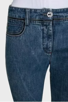 Blue straight-leg jeans with a distressed effect