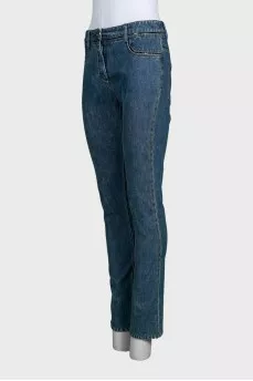 Blue straight-leg jeans with a distressed effect