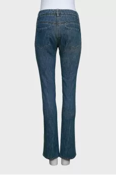 Blue straight-leg jeans with a distressed effect