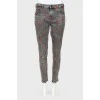 Jeans with embroidered chili