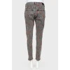 Jeans with embroidered chili