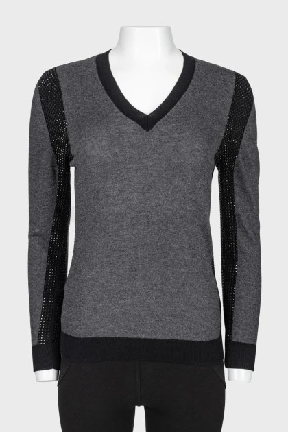 Pullover with black rhinestone inserts