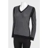 Pullover with black rhinestone inserts