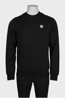 Men's black sweatshirt with a patch