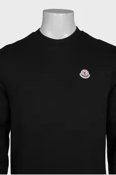 Men's black sweatshirt with a patch