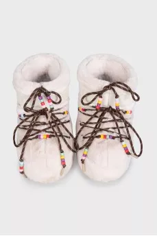 Beige fur boots