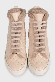 Beige boots with leather decoration
