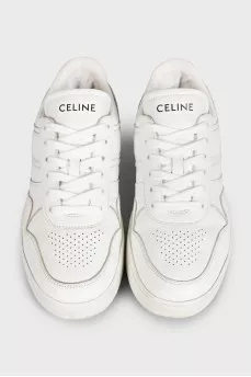 White leather sneakers with signature logo
