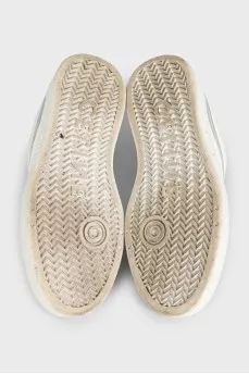 White leather sneakers with signature logo