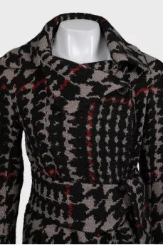 Black fitted coat with a printed belt