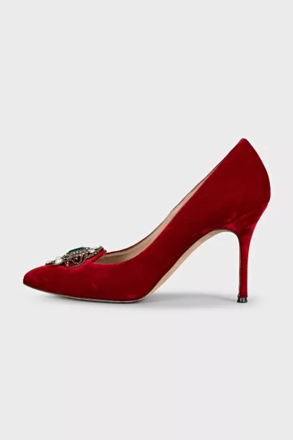 Red velvet pumps with decoration