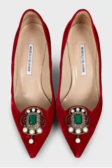 Red velvet pumps with decoration