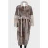 Double-sided coat with a belt