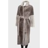 Double-sided coat with a belt