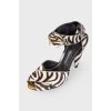 Pony leather sandals