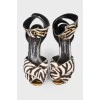 Pony leather sandals