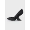 Suede shoes with shaped heel